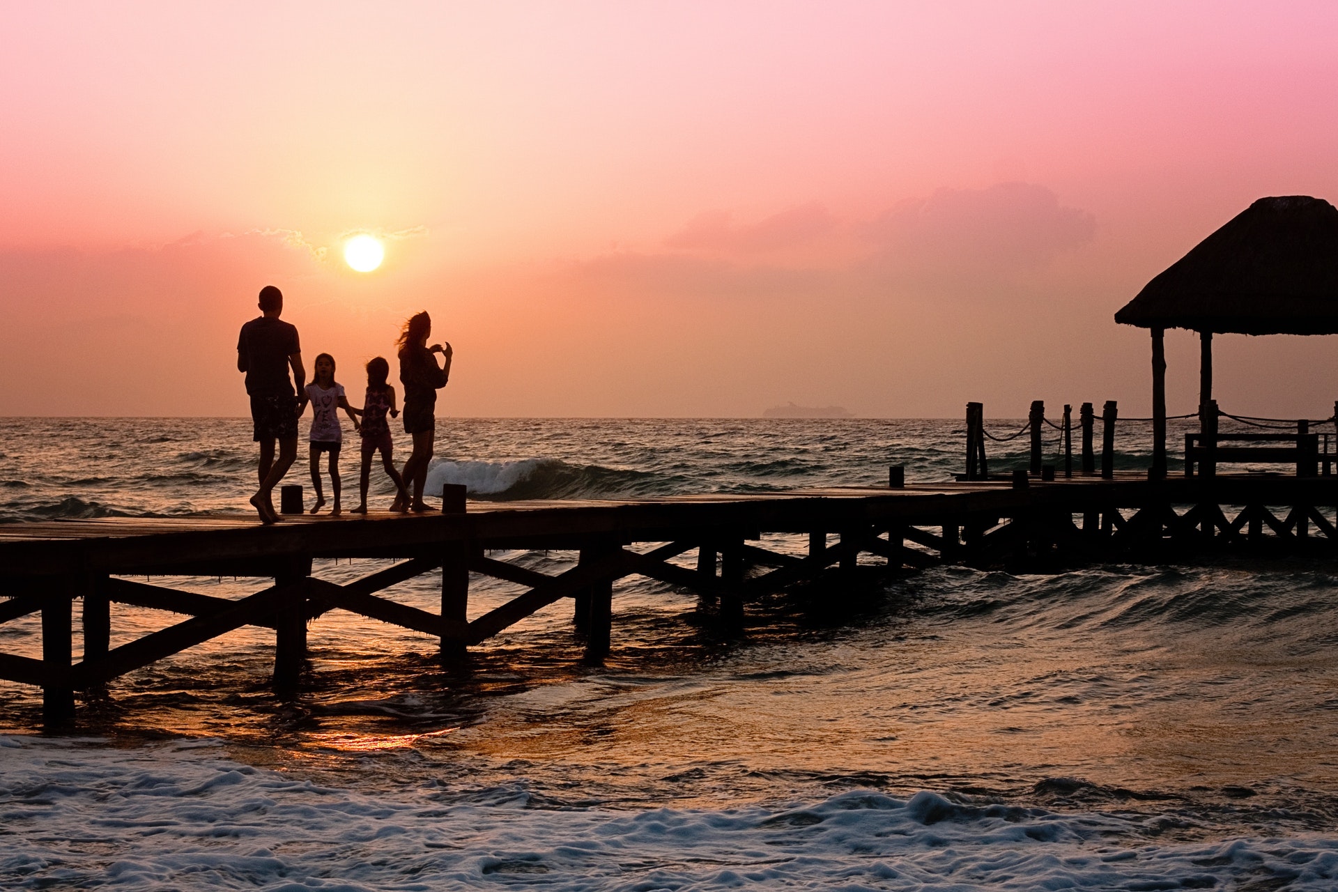 family-pier-man-woman-children