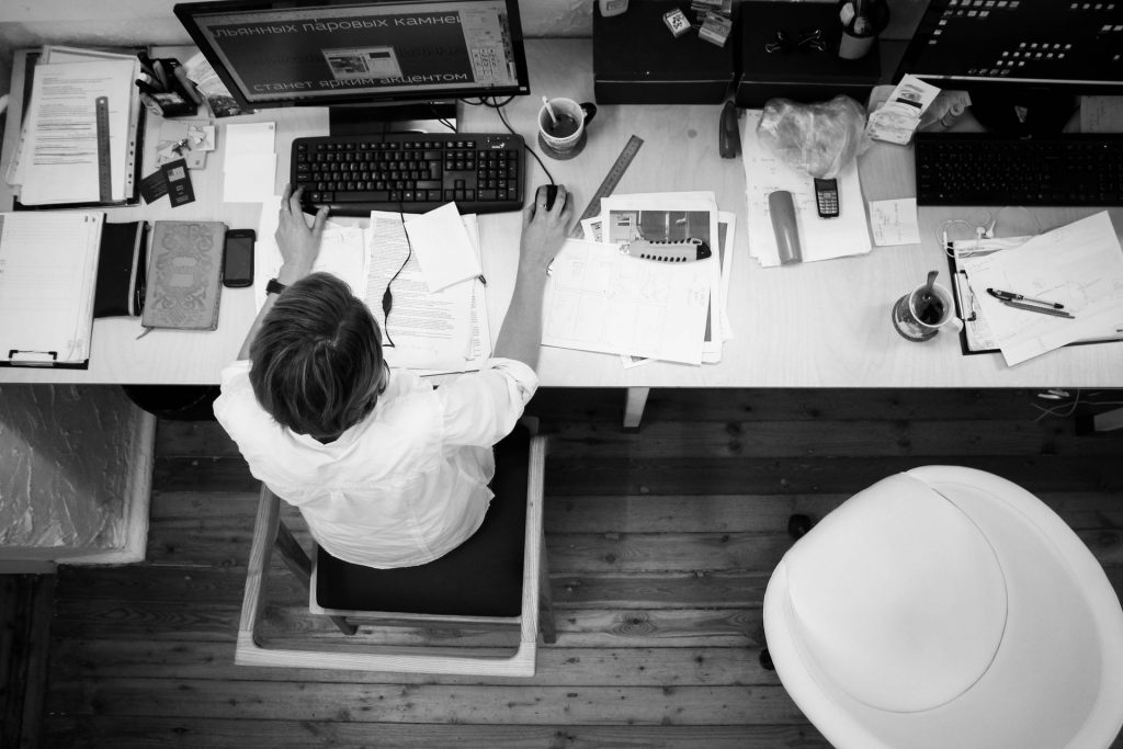 Ariel view of man on computer